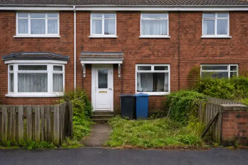 Tired-looking terraced house illustrating how a poor EPC rating can negatively affect the asking price