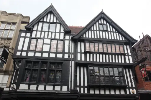 Tudor fronted properties on a British street where EPC exemptions may apply for listed buildings